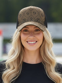 Woman wearing Greyhorse Trucker Cap in gold